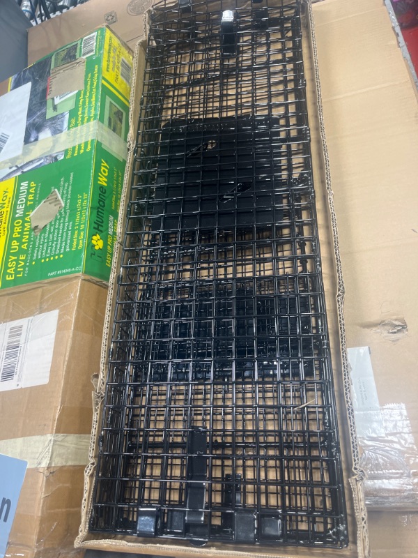 Photo 1 of ***SEE NOTES*** 
Humane Way Folding 32 Inch Live Humane Animal Trap - Safe Traps for All Animals - Raccoons, Cats, Groundhogs, Opossums - 32"x10"x12",Black