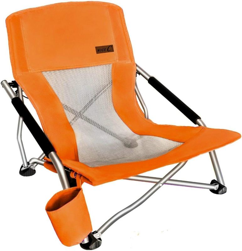 Photo 1 of 
Nice C Chair Beach, Low Beach Chair, Sling, Folding, Portable, Concert, for Adults, Kids, Boat, Sand Chair with Cup Holder & Carry Bag (1 Pack of Orange)
Color:Orange