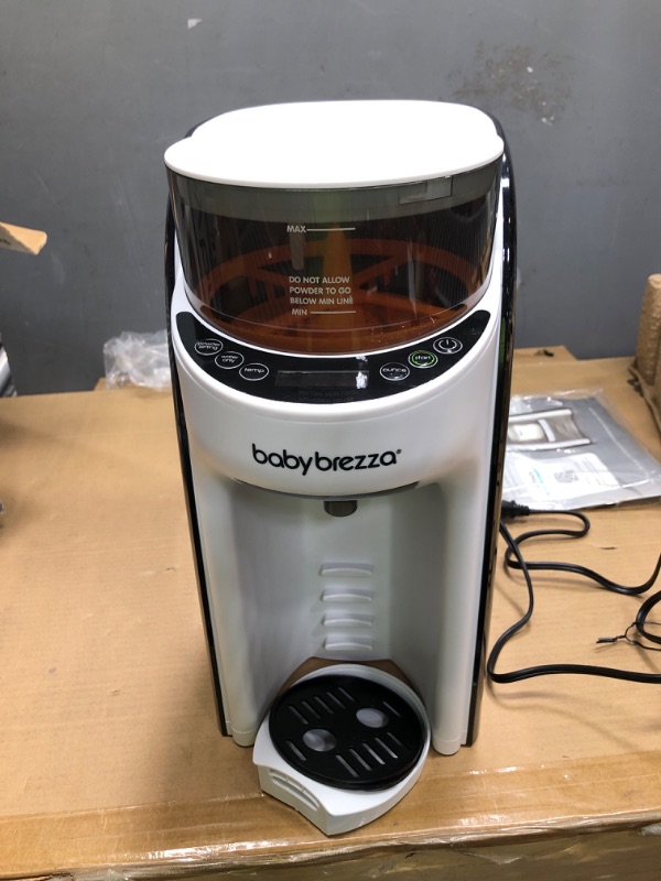 Photo 2 of Baby Brezza New and Improved Formula Pro Advanced Formula Dispenser Machine - Automatically Mix a Warm Formula Bottle Instantly - Easily Make Bottle with Automatic Powder Blending, White Base White