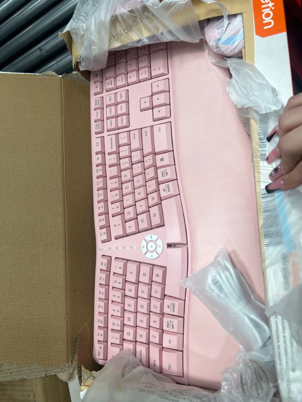 Photo 2 of MEETION Ergonomic Wireless Keyboard and Mouse, Ergo Keyboard with Vertical Mouse, Split Keyboard with Cushioned Wrist Palm Rest Natural Typing Rechargeable Full Size, Windows/Mac/Computer/Laptop, Pink Large Pink