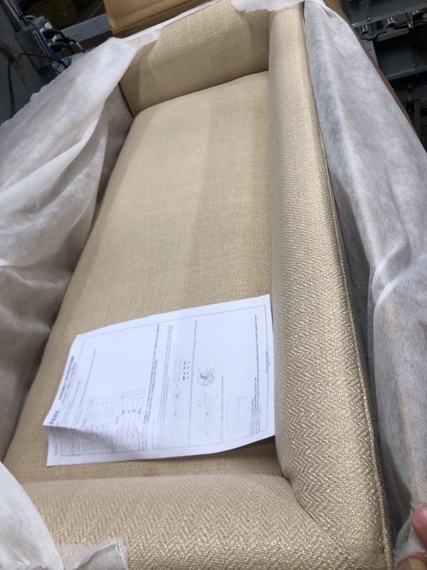Photo 1 of 4ft long tan small couch 