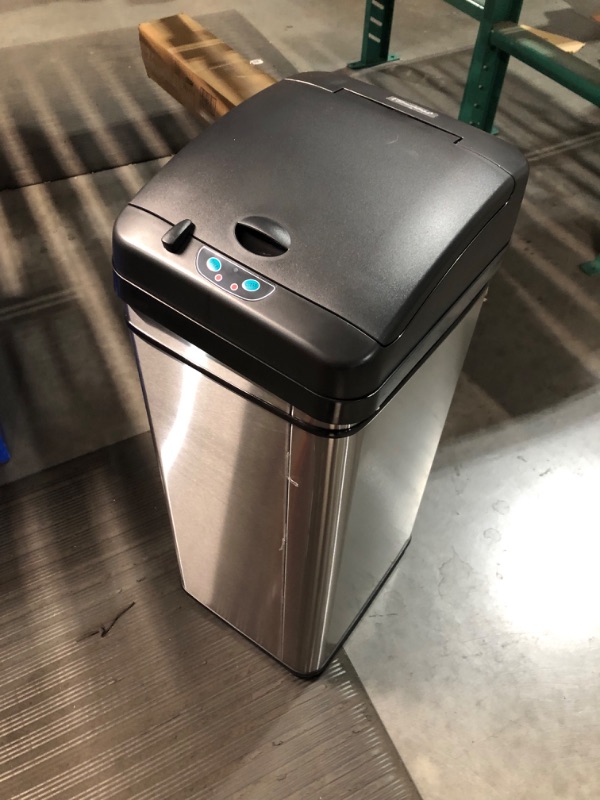 Photo 3 of ***DAMAGED - SEE COMMENTS***
iTouchless 13 Gallon Automatic Trash Can with Odor-Absorbing Filter and Lid Lock, Power by Batteries (not included) or Optional AC Adapter (sold separately), Black / Stainless Steel