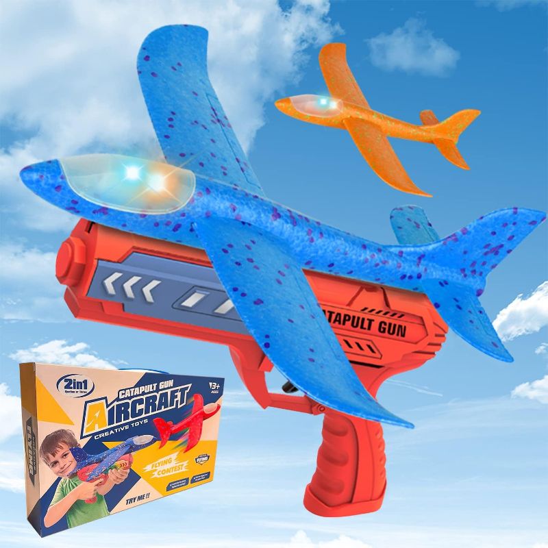 Photo 1 of Airplane Toy, 2 Flight Modes Catapult Plane Toy with LED Light, One-Click Ejection Foam Plane with Launcher Toys, Throwing Foam Shooting Game Outdoor Toys for 3 4 5 6 7 8 Year Old Kids
