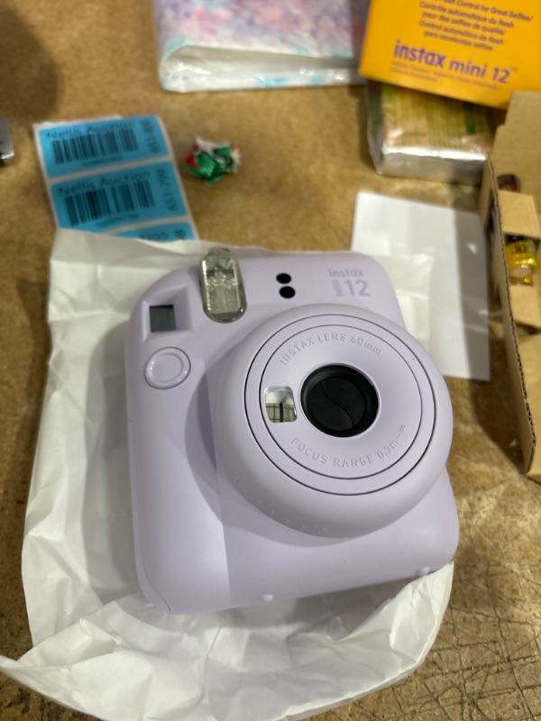 Photo 5 of Fujifilm Instax Mini 12 Purple Holiday Bundle 2023.
03.2025