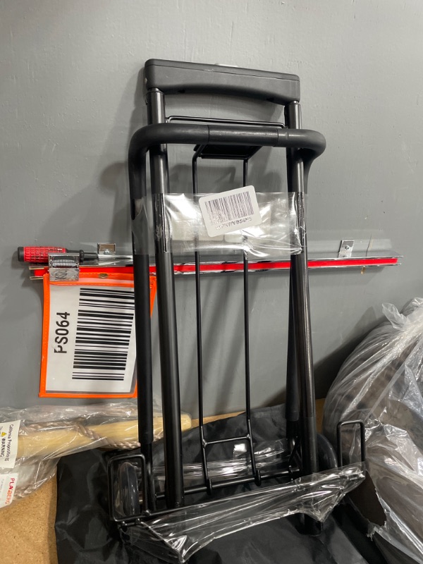 Photo 1 of Britax Car Seat Travel Cart | Adjustable Handle + Compact Fold + Fits in Airplane Overhead Bin , Black, 42x13.5x5.5 Inch (Pack of 1)