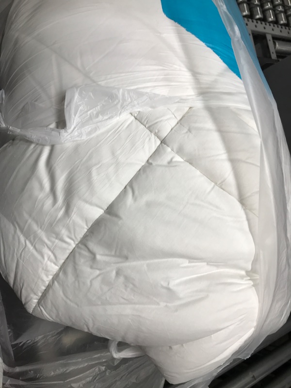 Photo 1 of White comforter 