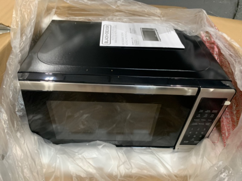 Photo 1 of 0.7 Cu. Ft. 700 Watt Compact Countertop Microwave in Stainless Steel with Safety Lock, One-Touch Button and Eco Mode
