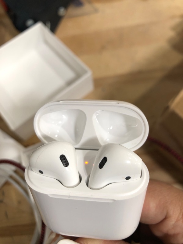 Photo 2 of Apple AirPods with Charging Case (Latest Model)