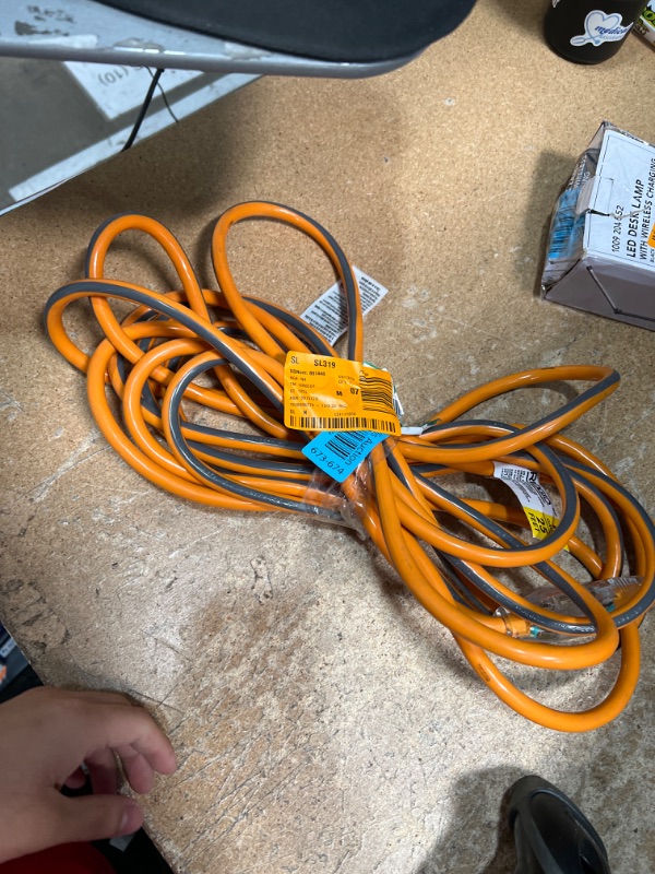 Photo 2 of 25 ft. 12/3 Heavy Duty Indoor/Outdoor Extension Cord with Tritap Lighted End, Orange/Grey
