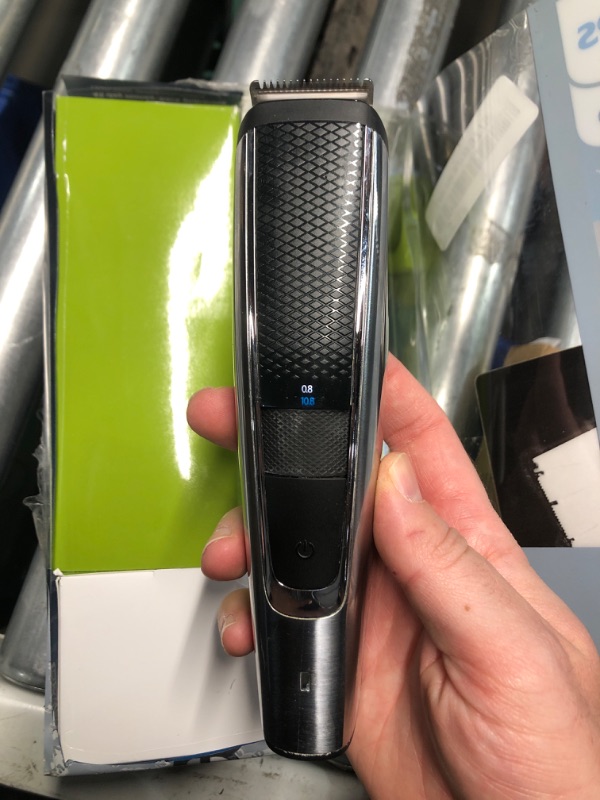 Photo 1 of (READ FULL POST) Norelco Philips Beard Trimmer and Hair Clipper Series 5500, Electric, Cordless, one Pass Beard Trimmer and Hair Clipper with Washable Feature for Easy Clean - No Blade Oil Needed - BT5511/49 Black and Silver 4 Piece Set