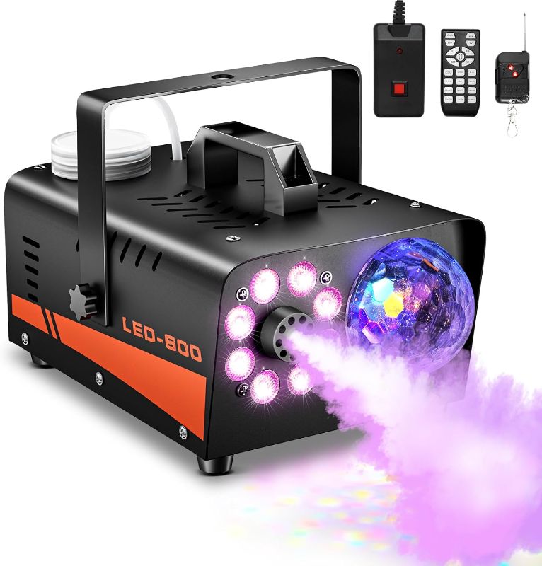 Photo 1 of (READ FULL POST) Smoke Machine, Fog Machine with Disco Ball Lights, 600W and 3000CFM with 13 Colorful LED Lights Effect, Wireless Remote Control, Suitable for Parties, Wedding, Halloween, and DJ Stage, Indoor
