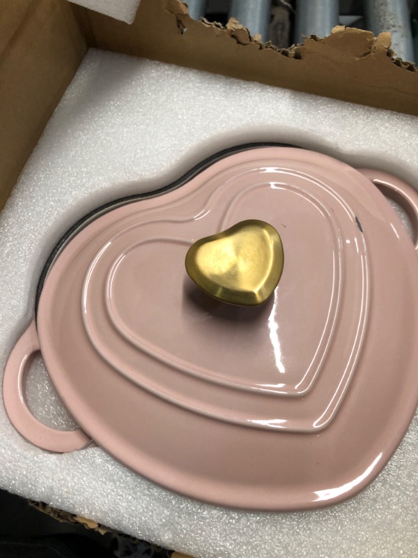 Photo 2 of ***MINOR DAMAGE***
Paris Hilton Enameled Cast Iron Dutch Oven Heart-Shaped Pot with Lid, Dual Handles, Works on All Stovetops, Oven Safe to 500°F, 2-Quart, Pink