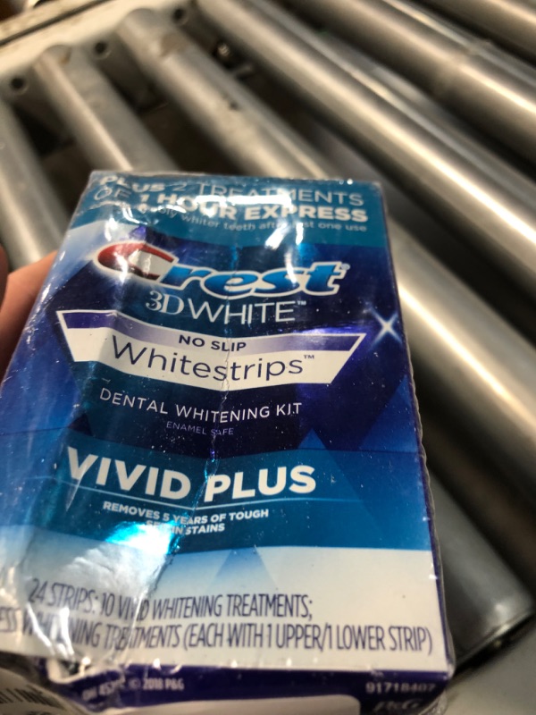 Photo 2 of ***FACTORY SEALED***
Crest 3DWhitestrips Vivid Plus 10 Treatments + 1 Hour Express 2 Treatments Teeth Whitening Kit