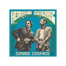 Photo 1 of **DAMAGED** Hermanos Gutierrez -- Sonido Cosmico LP light blue/green splatter