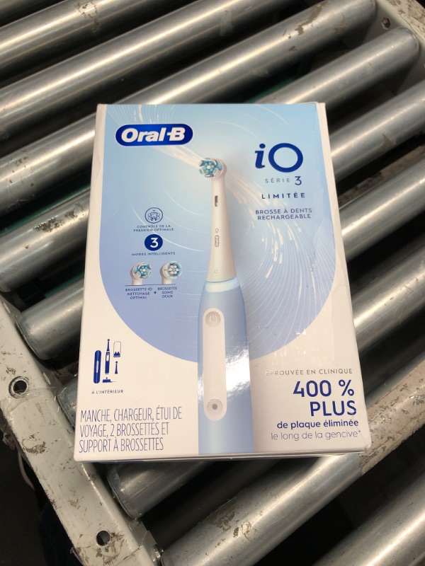 Photo 3 of ***FACTORY SEALED***Oral-B Power iO Series 3 Limited Electric Toothbrush, Icy Blue, iO3 Rechargeable Power Toothbrush with 2 Brush Heads, Travel Case and Refill Holder