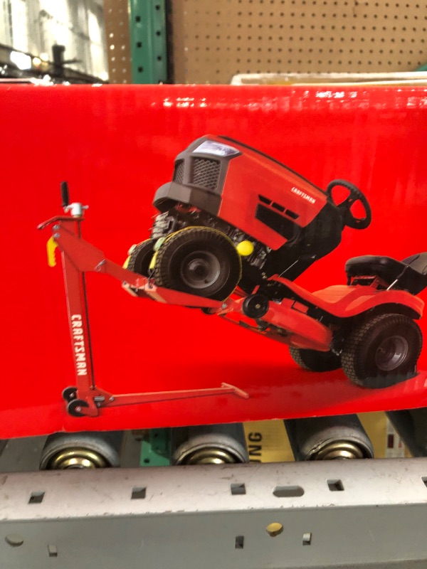 Photo 2 of ***FACTORY SEALED***
Craftsman 45099 Lift - 500lb Lifting Capacity, Fits Most Residential & Zero Turn Radius Riding Lawn Mowers, Space-Saving Foldable Design, Ideal for Lawn Mower Maintenance and Repairs