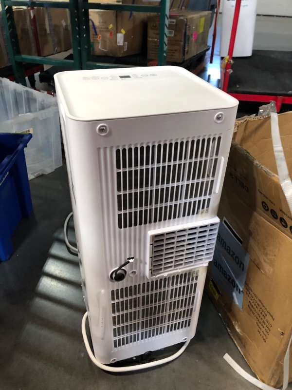 Photo 2 of ***USED - NO PACKAGING - LIKELY MISSING PARTS - UNABLE TO VERIFY FUNCTIONALITY***
Midea 10,000 BTU ASHRAE (7,100 BTU SACC) Portable Air Conditioner Smart Control, Cools up to 300 Sq. Ft., with Dehumidifier & Fan mode, Easy- to-use Remote Control & Window 