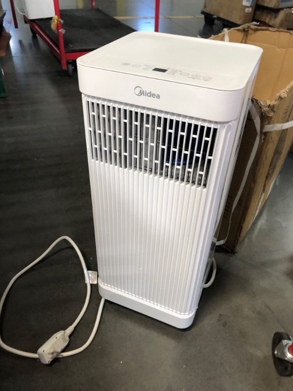 Photo 5 of ***USED - NO PACKAGING - LIKELY MISSING PARTS - UNABLE TO VERIFY FUNCTIONALITY***
Midea 10,000 BTU ASHRAE (7,100 BTU SACC) Portable Air Conditioner Smart Control, Cools up to 300 Sq. Ft., with Dehumidifier & Fan mode, Easy- to-use Remote Control & Window 