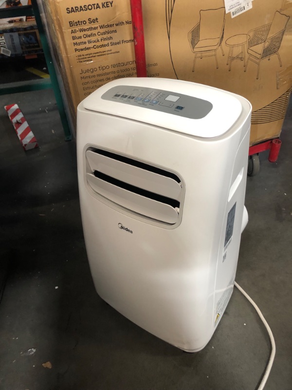 Photo 6 of ***USED - DAMAGED - SEE COMMENTS***
Midea 3-in-1 Portable Air Conditioner, Dehumidifier, Fan, for Rooms Up to 200 Sq ft Enabled, 10,000 BTU Doe (5,800 BTU SACC) Control with R MAP10S1CWT