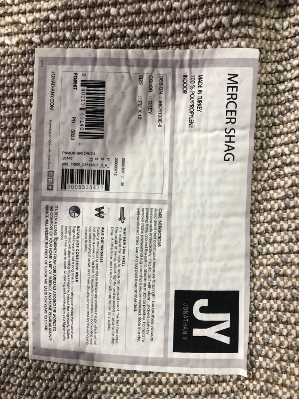 Photo 3 of ***USED - DIRTY - NO PACKAGING***
JONATHAN Y MCR100E-8 Mercer Shag Plush Tassel Indoor Area-Rug Bohemian Modern Contemporary Solid Easy-Cleaning Bedroom Kitchen Living Room, 8 X 10, Grey with Tassel