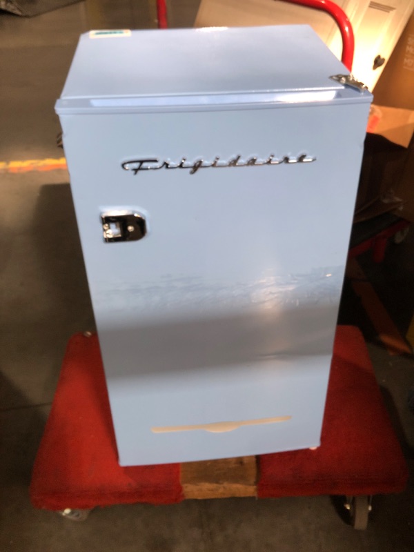 Photo 2 of ***DAMAGED - MISSING PARTS - UNTESTED - SEE COMMENTS***
Frigidaire Retro Compact Fridge with Chiller, 3.2 cu ft Countertop Fridge 16.5"D x 19"W x 31"H (Blue)