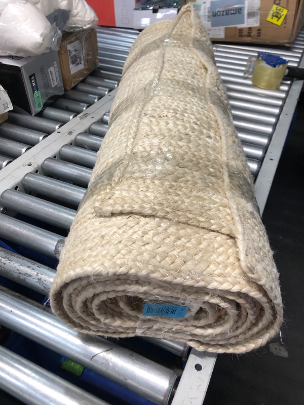 Photo 2 of ***USED - DIRTY - NO PACKAGING - SEE PICTURES***
nuLOOM 6x9 Rigo Jute Hand Woven Area Rug, Off White, Solid Farmhouse Design, Natural Fiber, For Bedroom, Living Room, Dining Room, Hallway, Office, Kitchen, Entryway 6' x 9' Off-white