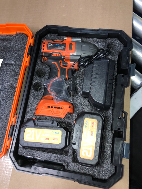 Photo 1 of Cordless Impact Wrench, 900Ft-lbs (1200N.m) 1/2" Brushless Impact Gun, 21V High Torque Power Impact Driver, 2x4.0Ah Batteries Electric Impact Motor Variable Speeds for Car/Truck RV/Mower