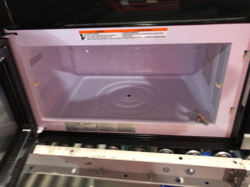 Photo 4 of ***HEAVILY USED AND DIRTY - MISSING PARTS - SEE COMMENTS***
BLACK+DECKER EM044KB19 Over The Range Microwave Oven with One Touch, 1000 Watts, 400 CFM and Sensor Cooking, OTR 1.9 Cu.ft