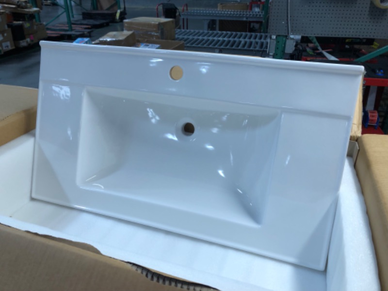 Photo 1 of ***USED - UNABLE TO CONFIRM EXACT MAKE AND MODEL - SEE PICTURES***
Drop In Vanity Top Sink For Bathroom, White, 36" x 20", 1 Drain Hole