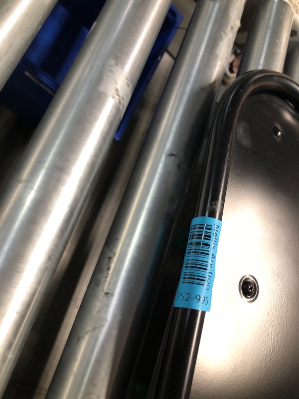 Photo 1 of **MAJOR TEAR IN SEAT STILL FUNCTIONAL**
Padded Folding Chair, Vinyl, Black, 300 lb.