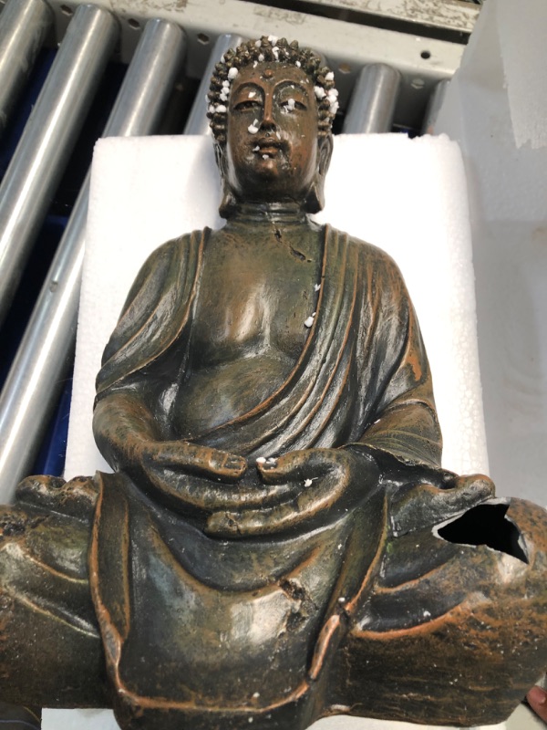 Photo 2 of **MAJOR DAMAGE HOLE IN KNEE STILL FUNCTIONAL**
Alpine Corporation GEM170 Buddha Statue, 10"L x 8"W x 15"H, Bronze Garden