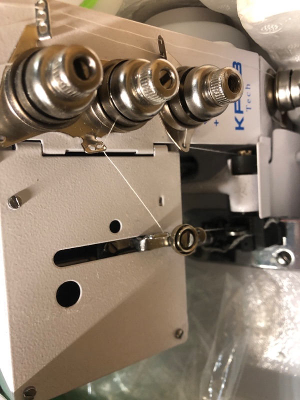 Photo 4 of **MINOR DAMAGE THREAD SEEMS TO BE CAUGHT IN MACHINE**
KPCB Serger Sewing Machine with Upgraded LED Light and Accessories Kit, Heavy-Duty Durable Metal Frame Overlock Machines