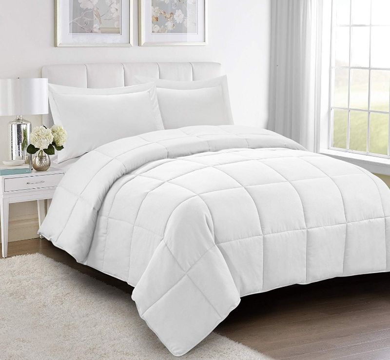 Photo 1 of ***STOCK PHOTO FOR REFERENCE ONLY***
 3pc Down Alternative Comforter Set - All Season Reversible Comforter with Two Shams - Quilted Duvet Insert with Corner Tabs - Box Stitched - Breathable, Soft, Fluffy(King/Cal King, Pure White/ black)