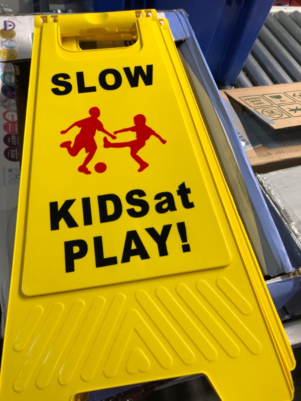 Photo 2 of Slow Kids at Play Signs, Children at Play Safety Signs 2 Pack, Text and Graphics Easier to Identify, Yellow Double Sided Signs for Schools, Street, Neighborhoods, Park, Day Cares, Sidewalk, Driveway