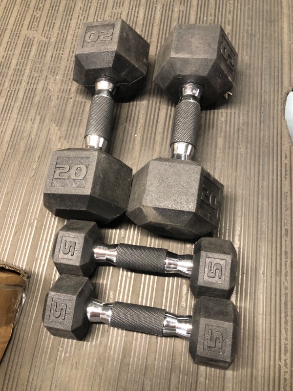 Photo 1 of ****sold as a set*** 2 twenty pound dumbbells and 2 five pound dumbbells'