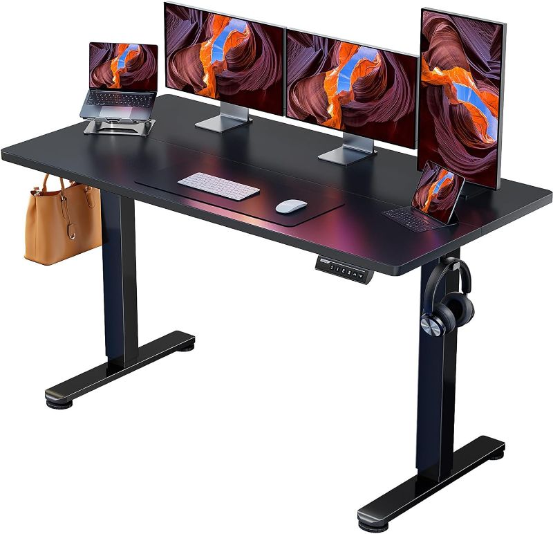 Photo 1 of (READ FULL POST) ErGear Height Adjustable Electric Standing Desk, 55 x 28 Inches Sit Stand up Desk, Memory Computer Home Office Desk (Black)
