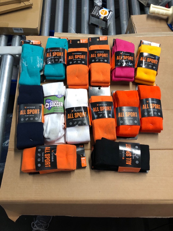 Photo 1 of **BUNDLE**NO RETURNS**Variety of Team Socks**Small, Med & Lg**