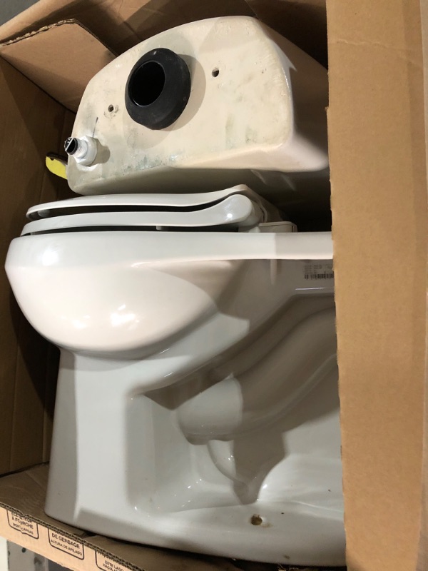 Photo 2 of (PREVIOUSLY INSTALLED SLIGHTLY USED) Reliant 2-Piece 1.28 GPF Single Flush Round Toilet with Slow Close Seat in White