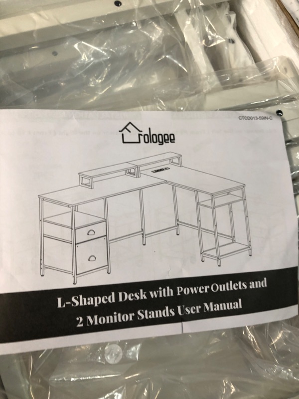 Photo 2 of Furologee White 59” L Shaped Desk with Power Outlet, Reversible Computer Desk with File Drawer & 2 Monitor Stands, Corner Home Office Desk with Storage Shelves for Gaming Writing White 59 inch With Outlets
