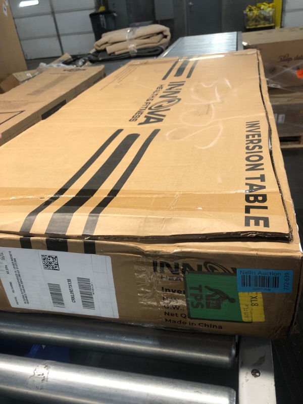 Photo 1 of Innova Inversion Table with Adjustable Headrest, Reversible Ankle Holders, and 300 lb Weight Capacity Standard