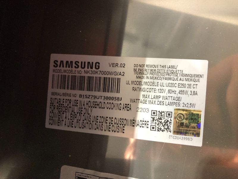 Photo 4 of ***DAMAGED - DENTED, WARPED, AND SCRATCHED - LIKELY MISSING PARTS - UNABLE TO TEST***
Samsung 30" Wall Mount Hood in Black Stainless Steel, NK30K7000WG/A2