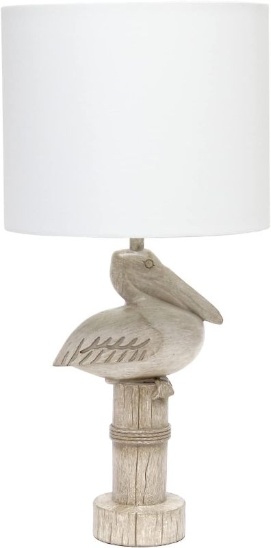 Photo 1 of **NON REFUNDABLE ITEM**(FOR PARTS ONLY)
Simple Designs LT1091-PEL Shoreside 17.25" Tall Coastal Sitting Pelican Beige Wash Polyresin Bedside Table Desk Lamp w White Fabric Drum Shade for Décor, Accent, Beach, Seaside, Living Room, Bedroom