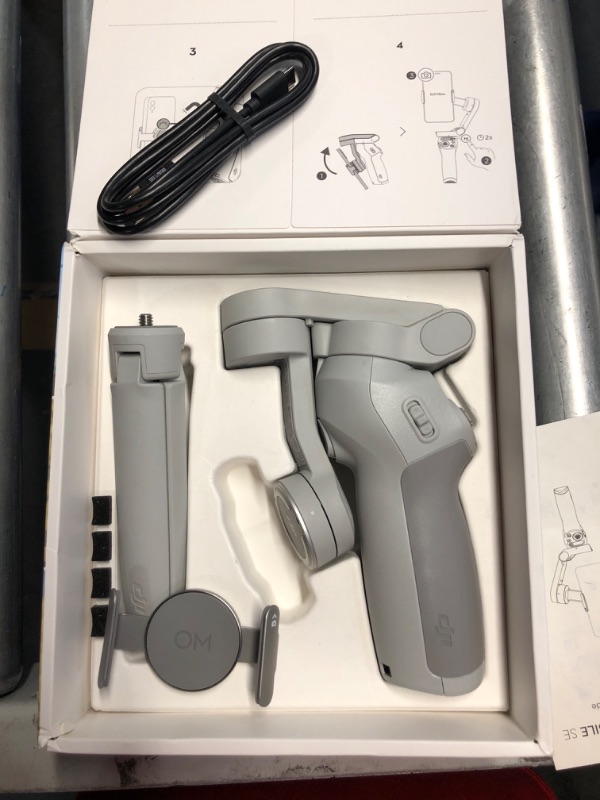 Photo 2 of ***NON-REFUNDABLE NO RETURNS SOLD AS IS**PARTS ONLY***DJI Osmo Mobile SE Intelligent Gimbal, 3-Axis Phone Gimbal, Portable and Foldable, Android and iPhone Gimbal with ShotGuides, Smartphone Gimbal with ActiveTrack 6.0, Vlogging Stabilizer
