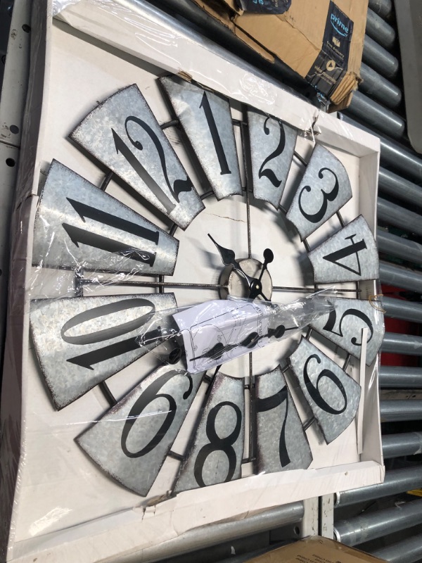 Photo 4 of ***USED - DAMAGED - BENT - UNABLE TO TEST***
Large Farmhouse Wall Clock, 27 Inch Galvanized Windmill Metal Clock Wall Decor, Big Wall Clock Decorative for Kitchen Living Room Bedroom, Silent Non-Ticking Battery Operated