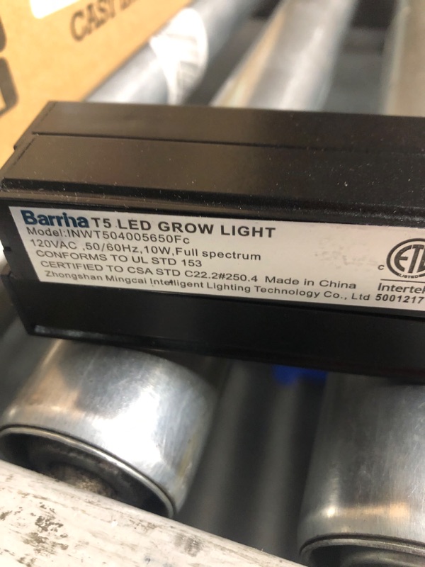 Photo 2 of [READ NOTES]
Barrina T5 Grow Lights for Indoor Plants, 2FT 5000K Full Spectrum LED Grow Light with Black Cover, T5 Grow Light Strip, Under Cabinet Plant Light with Switch Cord, Linkable, Plug and Play, 4 Packs White Black Cover