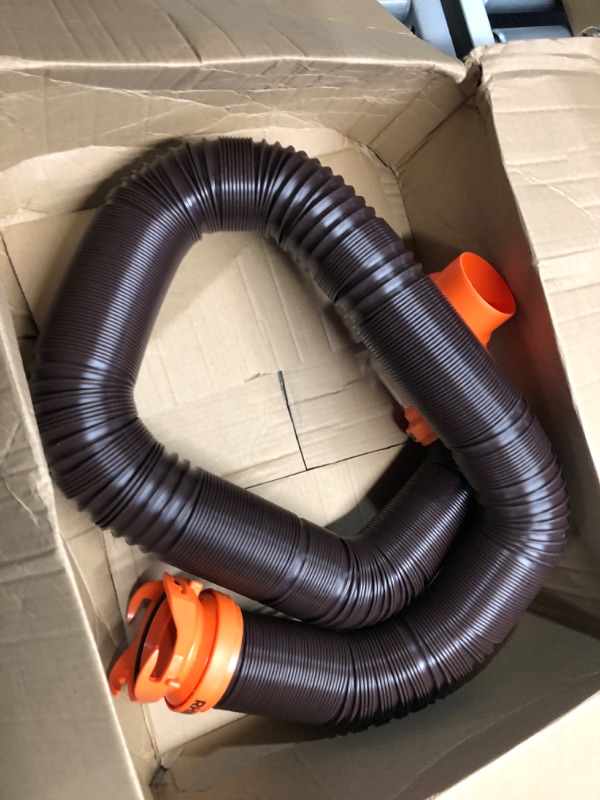 Photo 2 of *****STOCK IMAGE FOR SAMPLE*****
1 - Camco RhinoFLEX 20-Ft Camper/RV Sewer Hose Kit - Features Clear Elbow Fitting w/Removable 4-in-1 Adapter - Connects to 3” Slip or 3”/3.5”/4” NPT Threaded Sewer Connection (39742) 1 Hose