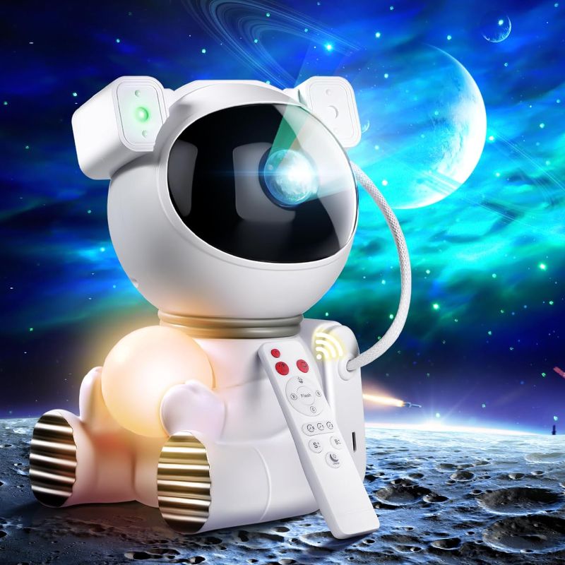 Photo 1 of Northern Galaxy Light Aurora Projector with 33 Light Effects, Night Lights LED Star Projector for Bedroom Nebula Lamp, Remote Control, White Noises, Bluetooth Speaker for Parties?Astronaut)