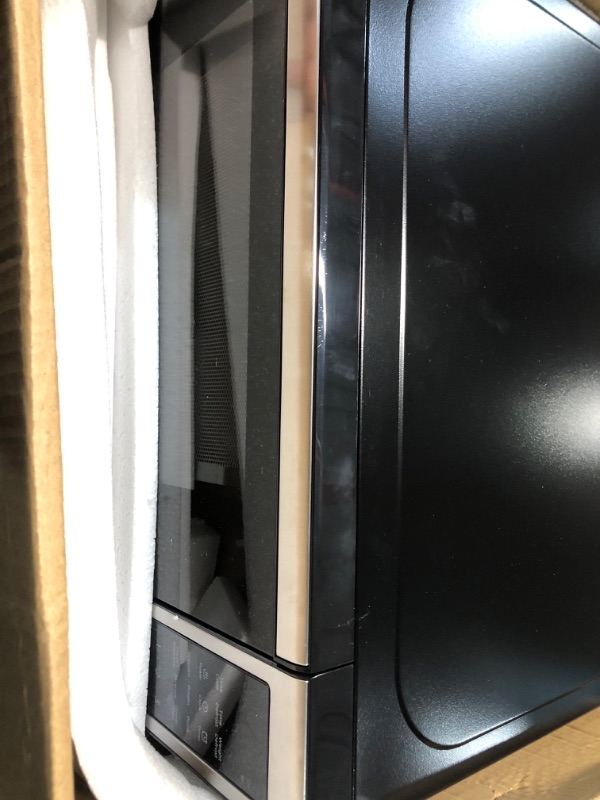 Photo 1 of **NON-REFUNDABLE, PARTS ONLY** BLACK+DECKER EM720CB7 Digital Microwave Oven with Turntable Push-Button Door, Child Safety Lock, 700W, Stainless Steel, 0.7 Cu.ft
