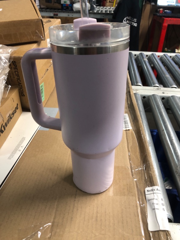 Photo 2 of ***(MAJOR DAMAGE/ SEE NOTES)***
Stanley Quencher H2.0 FlowState Stainless Steel Vacuum Insulated Tumbler with Lid and Straw for Water, Iced Tea or Coffee, Smoothie and More, Lilac, 40 OZ / 1.18 L