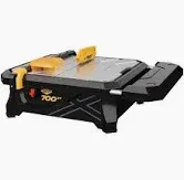 Photo 1 of **DIRTY** 700XT 3/4 HP Wet Tile Saw with 7 in. Blade and Table Extension
